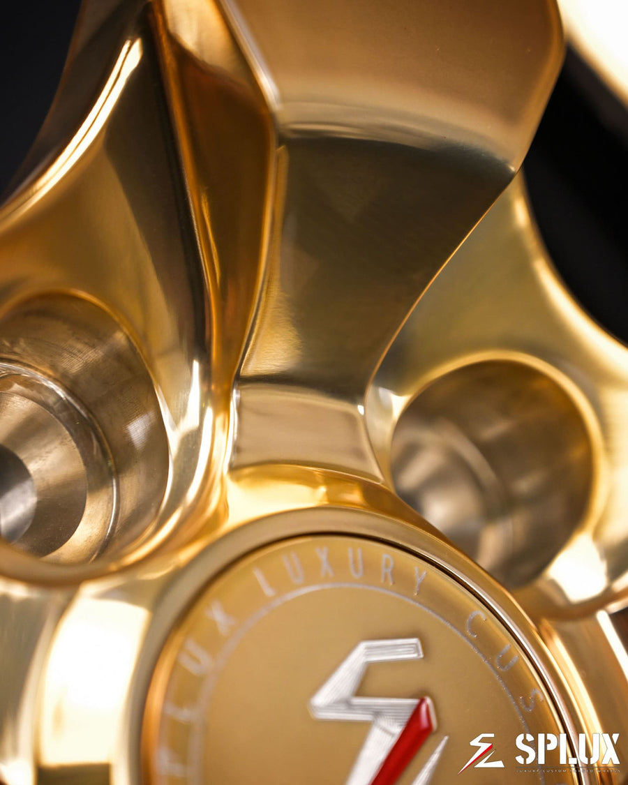 Polished frozen gold spokes and chrome barrel on the SD-06 wheel