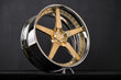 SD-06 forged wheel with a chrome lip and gold spokes, mounted on a Chrysler 300C