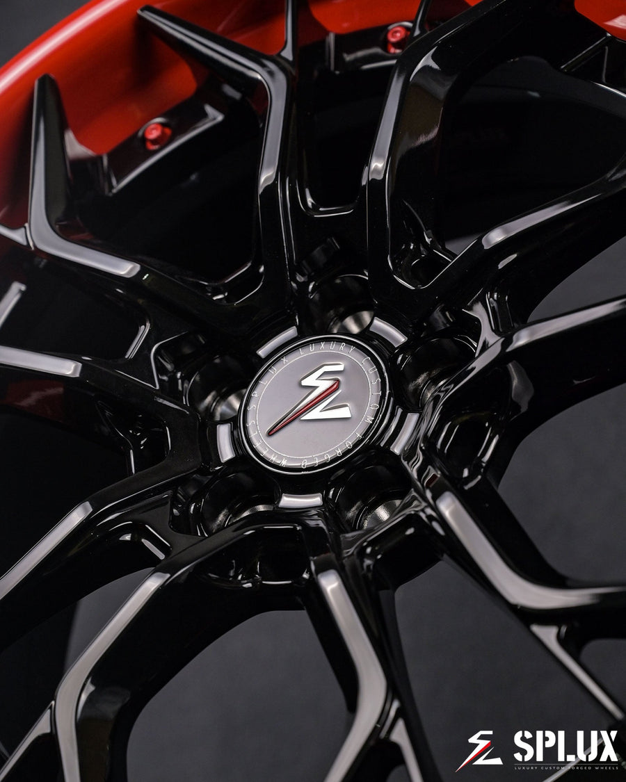 2011 wrx aftermarket wheels gloss black barrel and red lip close-up
