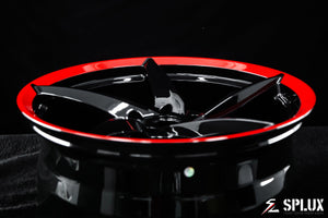 SC-09M forged wheels with a gloss red lip and black diamond spokes on the CTS-V
