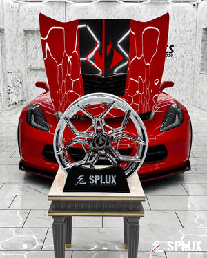 SC-18M wheel with chrome finish and red brake caliper visible
