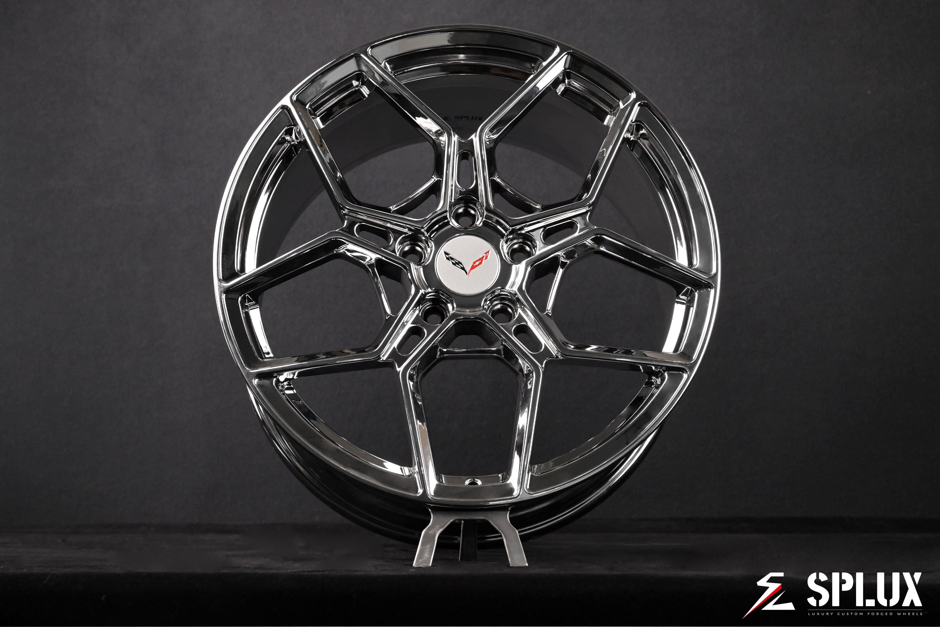 The rear 19-inch SC-18M wheel in chrome with a deep dish and custom center cap