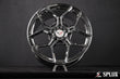 The rear 19-inch SC-18M wheel in chrome with a deep dish and custom center cap