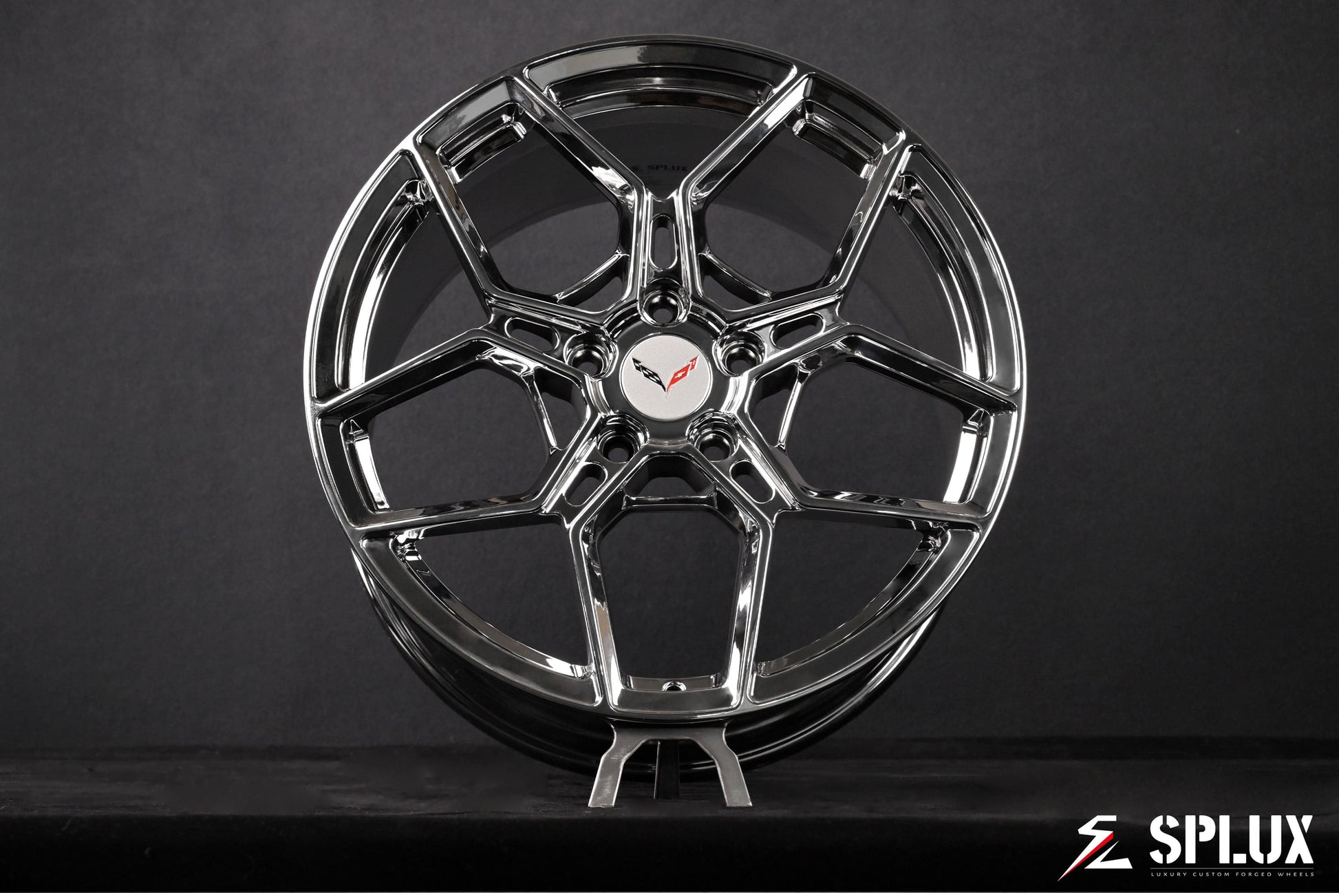 The rear 19-inch SC-18M wheel in chrome with a deep dish and custom center cap