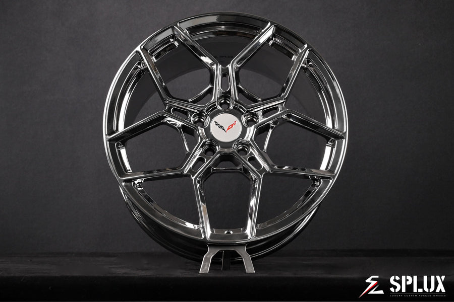 The rear 19-inch SC-18M wheel in chrome with a deep dish and custom center cap