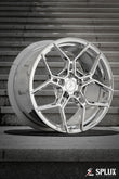 Side view of the Corvette C7 Stingray with staggered 18-inch front and 19-inch rear chrome wheels