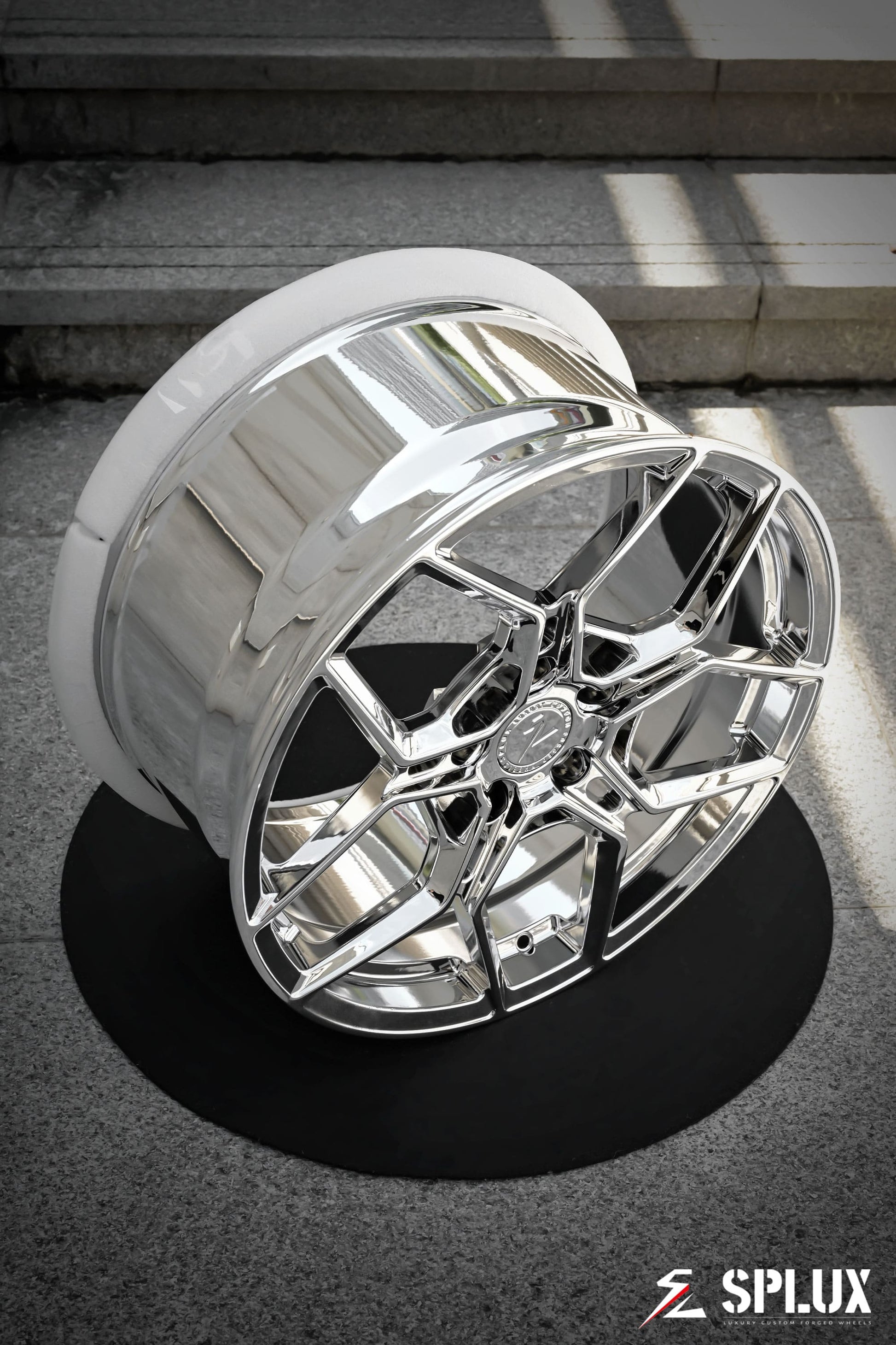 SC-18M forged wheel in chrome with a polished barrel and intricate spoke design