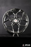 Detail of the SC-18M wheel's five split spokes and chrome finish on the Corvette