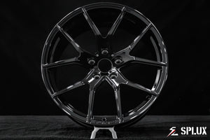 Staggered 19-inch front and 20-inch rear SC-04M forged wheels with a deep concave face