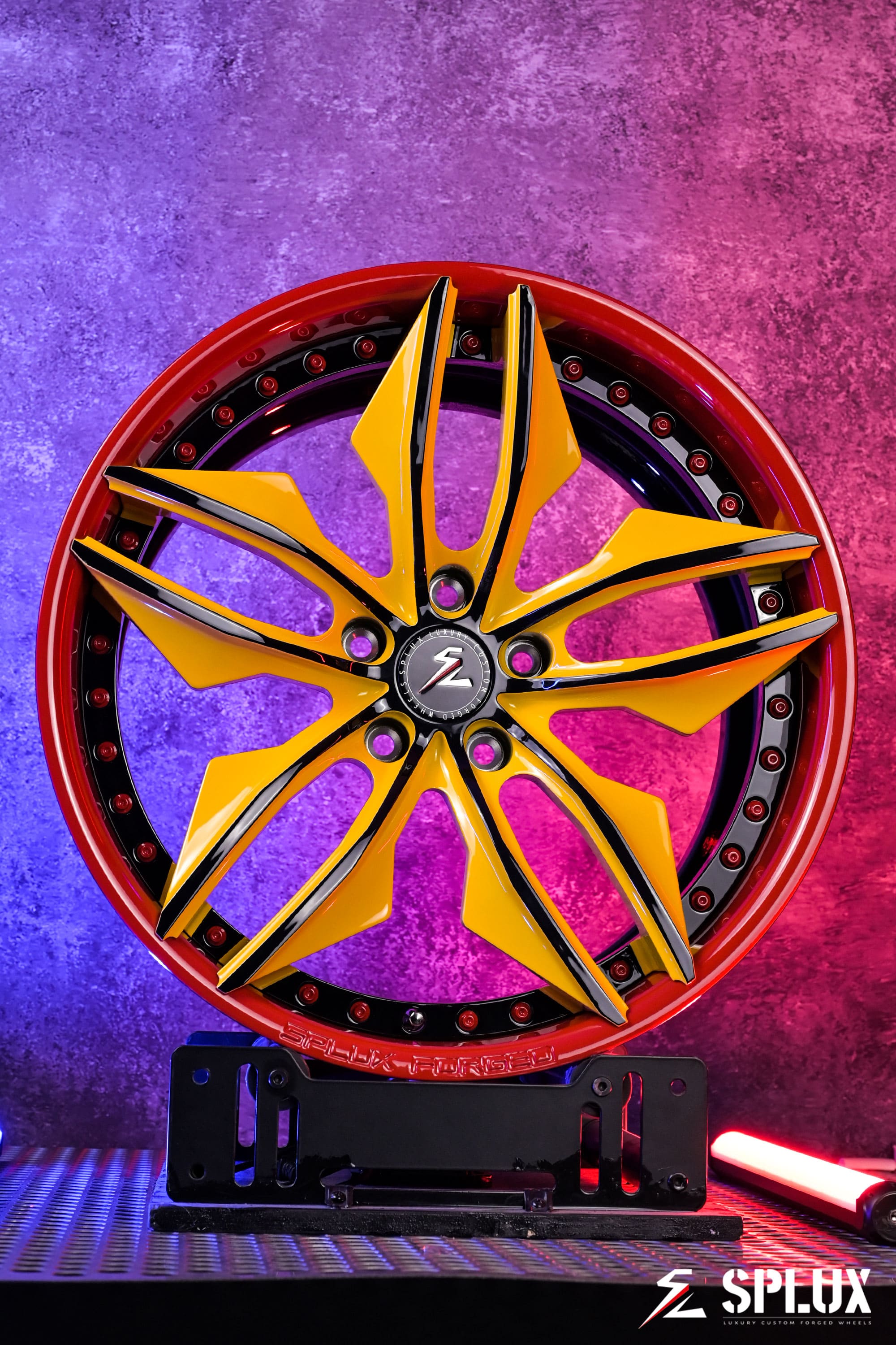 SR-05 forged wheel with deep lip, gloss red lip and hardware, yellow spokes on the Corvette