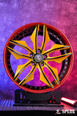 SR-05 forged wheel with deep lip, gloss red lip and hardware, yellow spokes on the Corvette