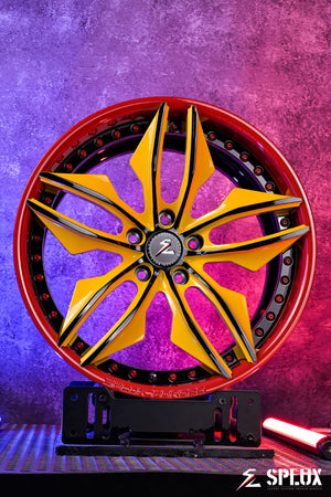 SR-05 forged wheel with deep lip, gloss red lip and hardware, yellow spokes on the Corvette