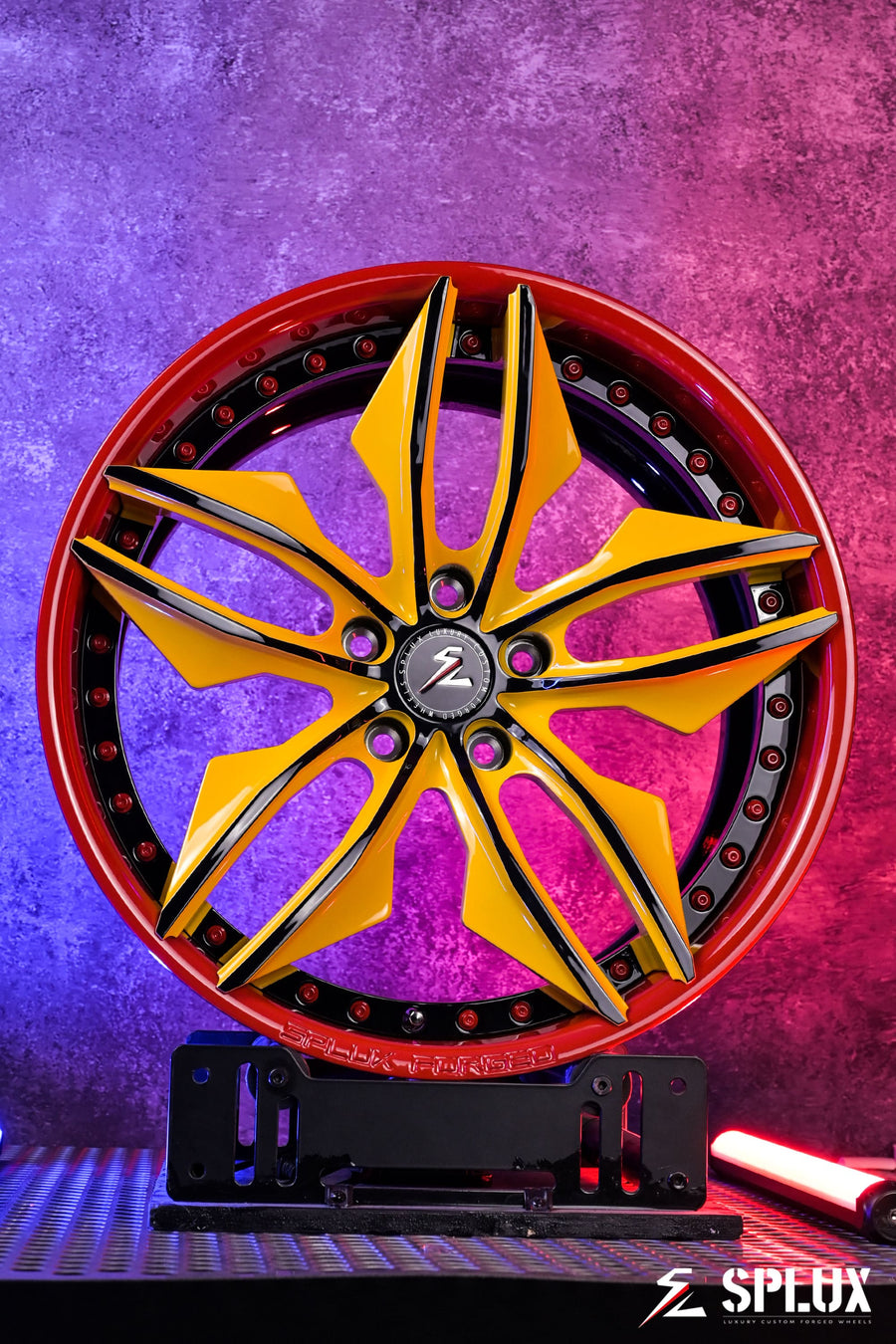 SR-05 forged wheel with deep lip, gloss red lip and hardware, yellow spokes on the Corvette