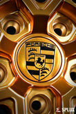 Porsche Cayman aftermarket rims with Piano Black hardware