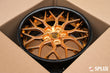 SA-01 forged 2-piece wheel with Polished Copper spokes and Piano Black barrel