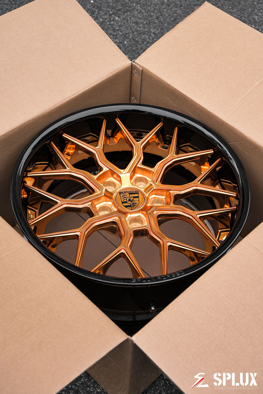Custom Porsche logo center cap on the Polished Copper SA-01 wheel