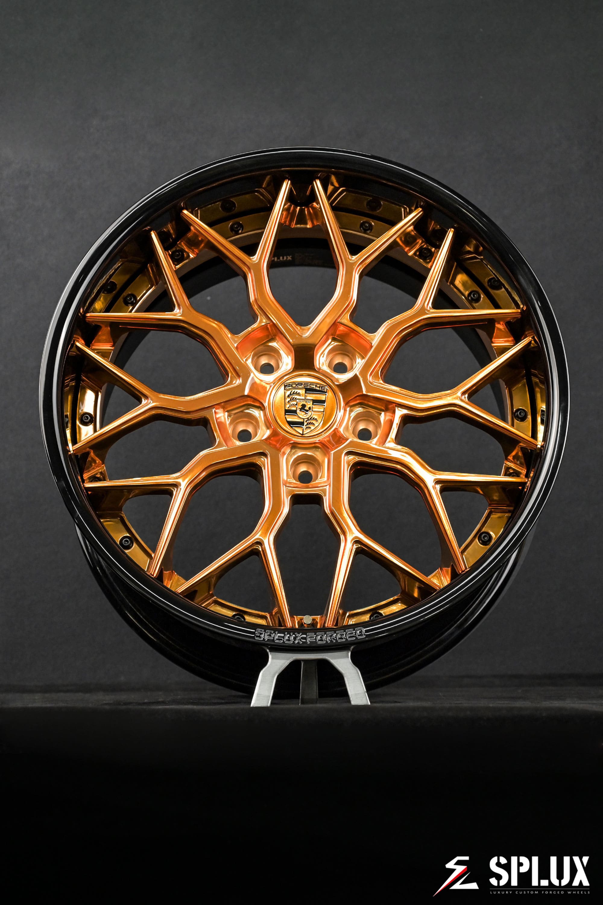 Porsche Cayman custom wheels in Piano Black and Polished Copper