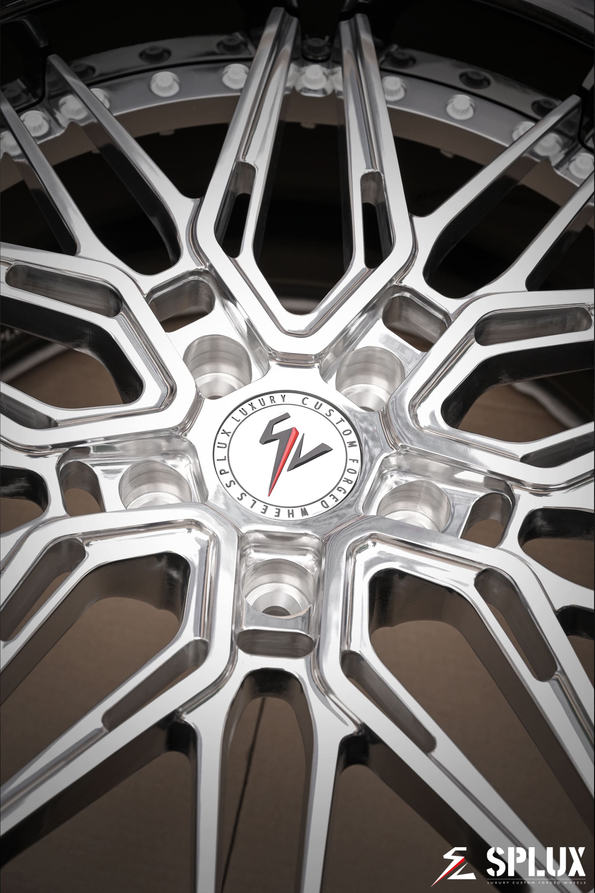 Camaro ZL1 rims with white hardware around the center cap