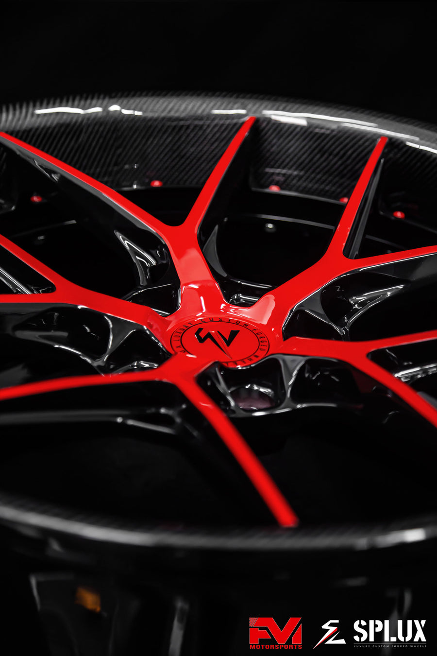 Red Corvette black rims with a carbon fiber wrapped lip and deep dish profile