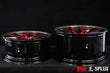 Corvette red wheels with a piano black barrel and carbon fiber lip detail