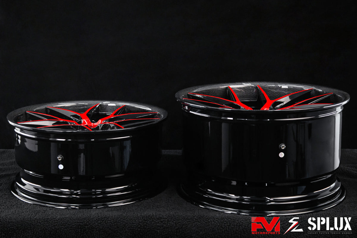 Corvette red wheels with a piano black barrel and carbon fiber lip detail