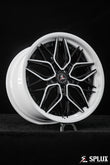 C8 Corvette with black rims and piano black spokes with ivory trim
