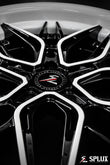 White Corvette rims with piano black inner barrel and black hardware