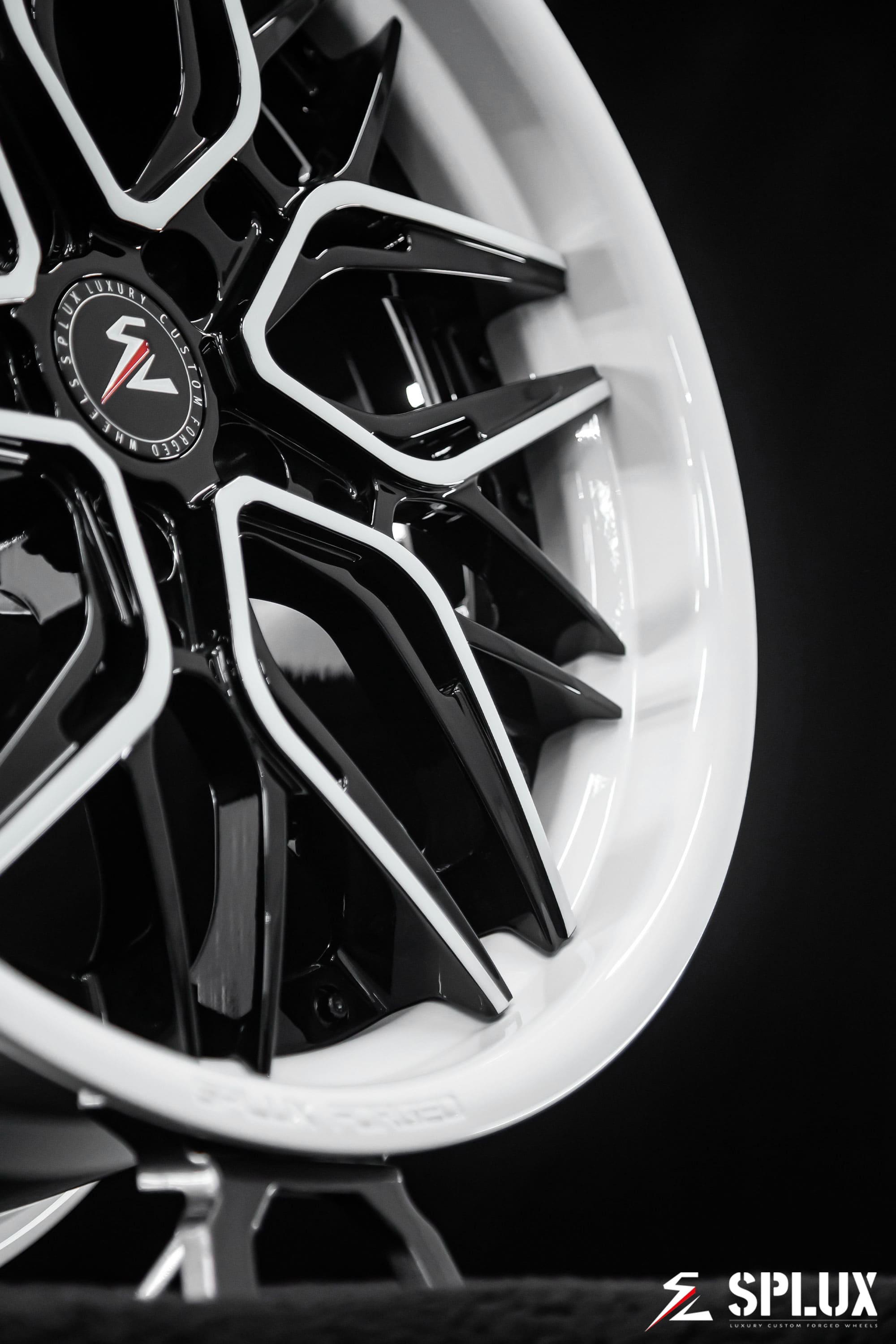 White Corvette wheels with a deep concave spoke profile
