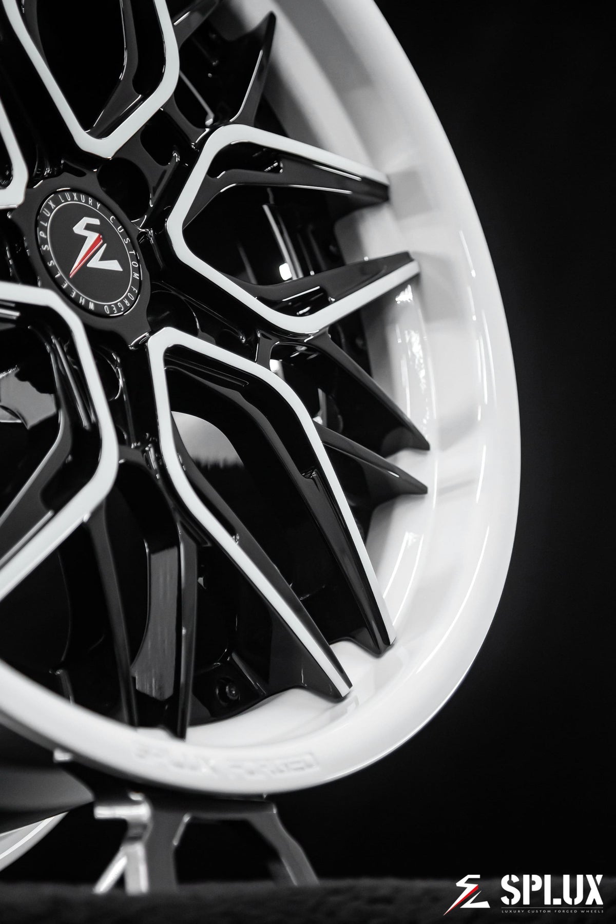 White Corvette wheels with a deep concave spoke profile