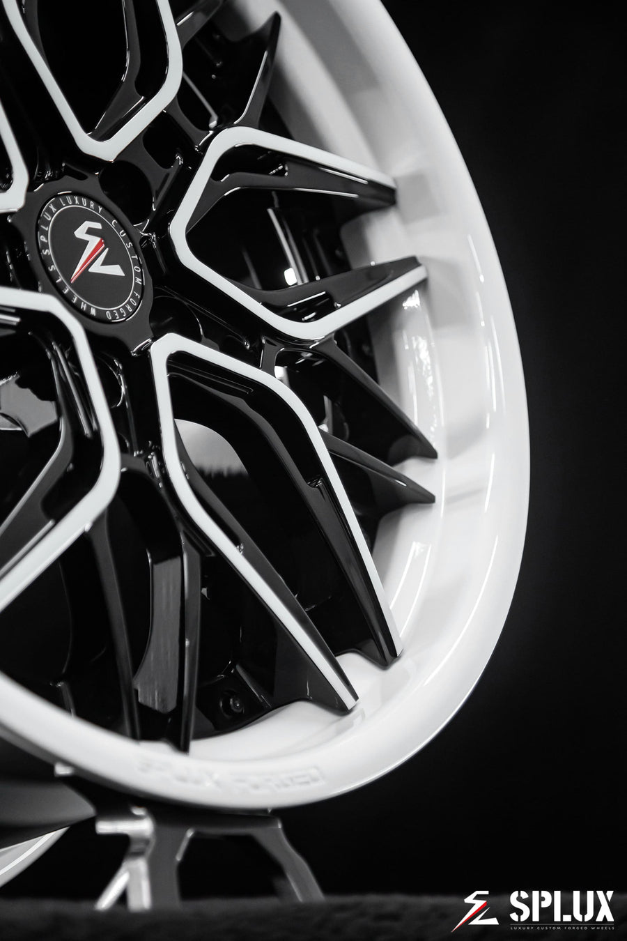 White Corvette wheels with a deep concave spoke profile