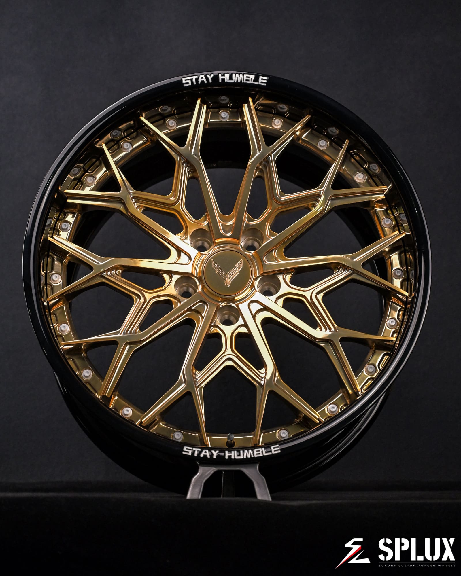 Rear 20-inch SD-08 wheel with polished frozen gold spokes on a C8 Stingray