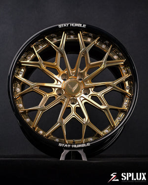 Rear 20-inch SD-08 wheel with polished frozen gold spokes on a C8 Stingray