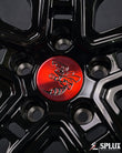 dodge challenger custom wheels close-up with brushed red barrel and chrome hardware