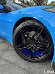 Close-up of a Chevrolet Corvette C8 Stingray with Splux SC-03M wheels featuring deep concave design and brushed blue inner barrel.