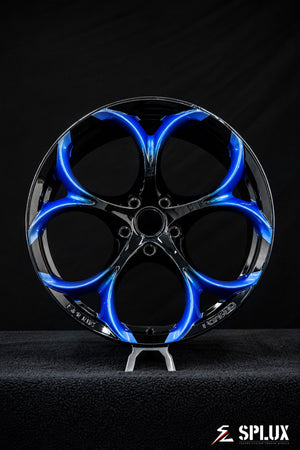 Staggered 19-inch front and 20-inch rear SC-07M wheels with concave spokes and custom center caps