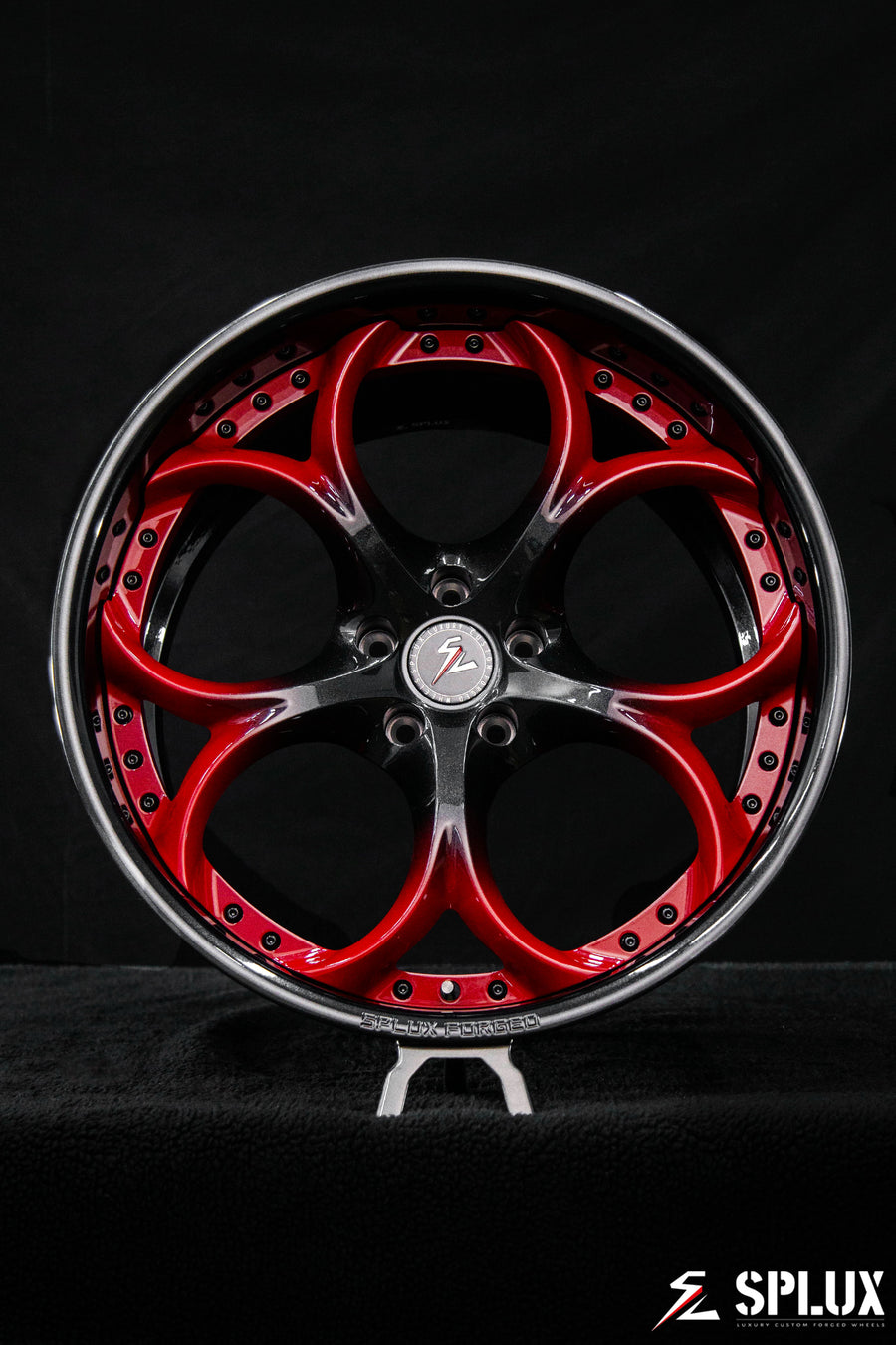 Front 20-inch SD-03 forged wheel with carbon flash barrel and dark red spokes