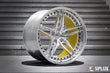 Corvette z06 rims with polished spokes and a gloss yellow inner barrel