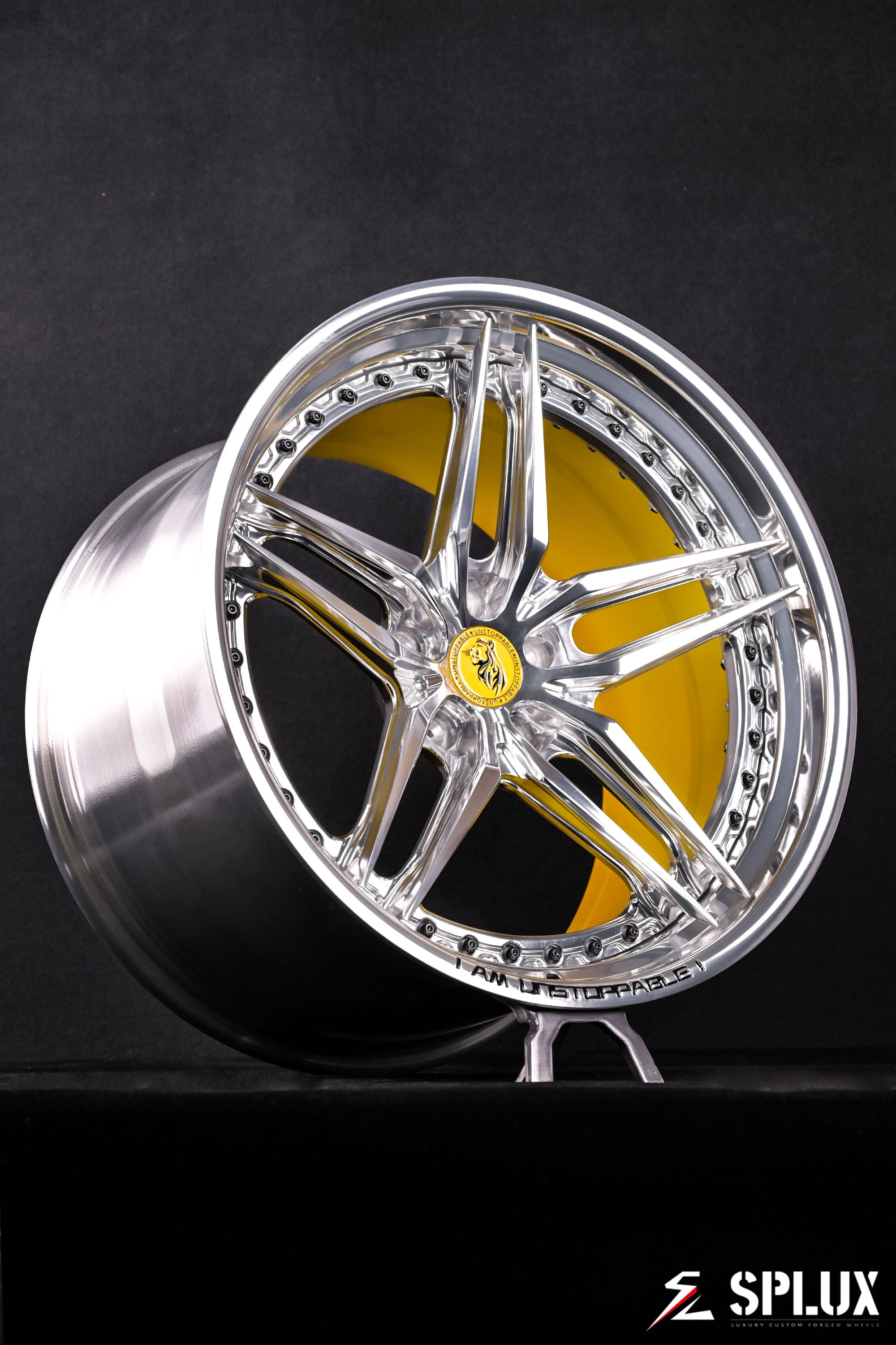 Rear 21-inch SA-01 forged wheel with polished aluminum lip and gloss yellow barrel
