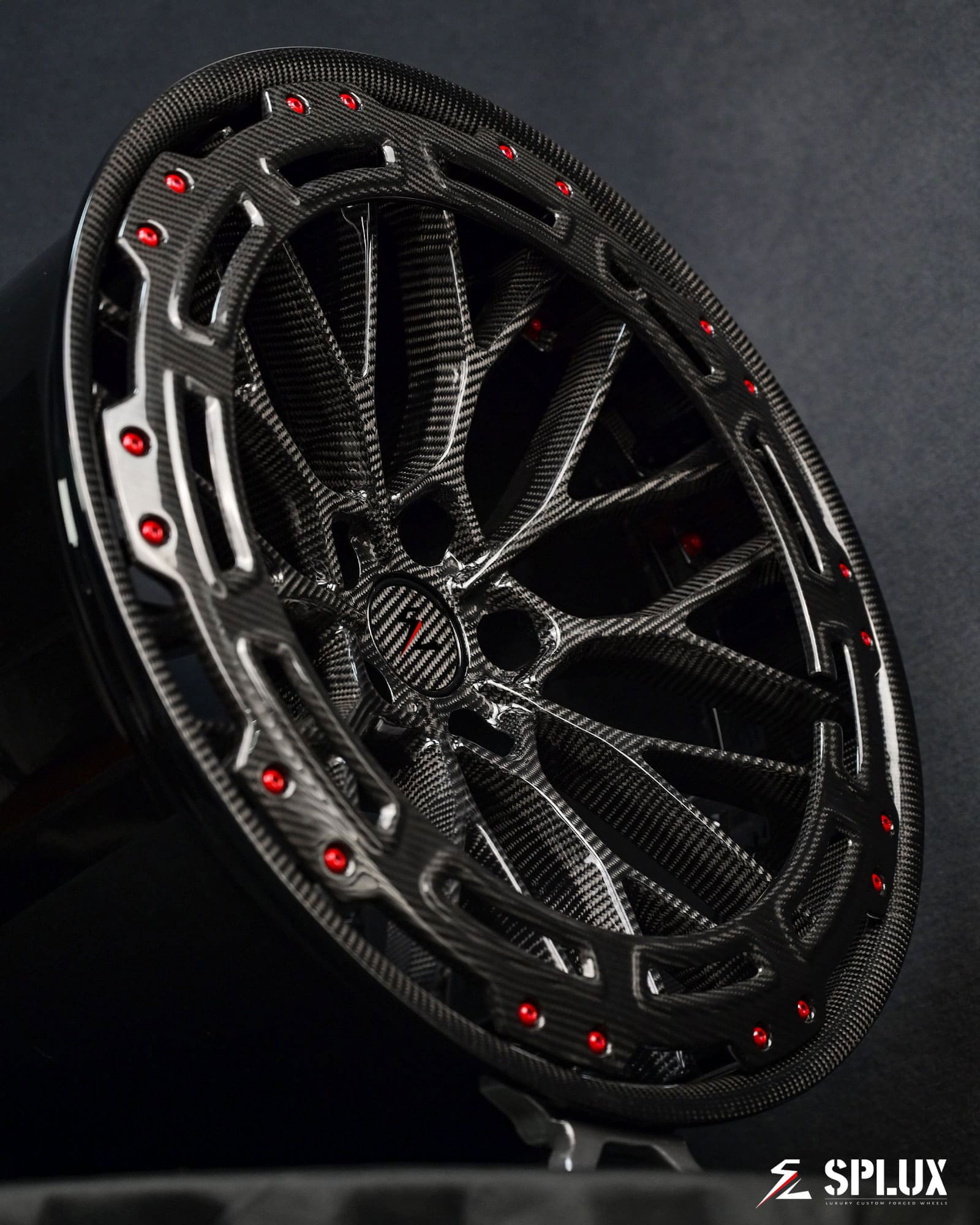 corvette carbon fiber wheels with red hardcores. Aero Ring deep dish y-spoke design, forged 2-piece luxury wheels. 