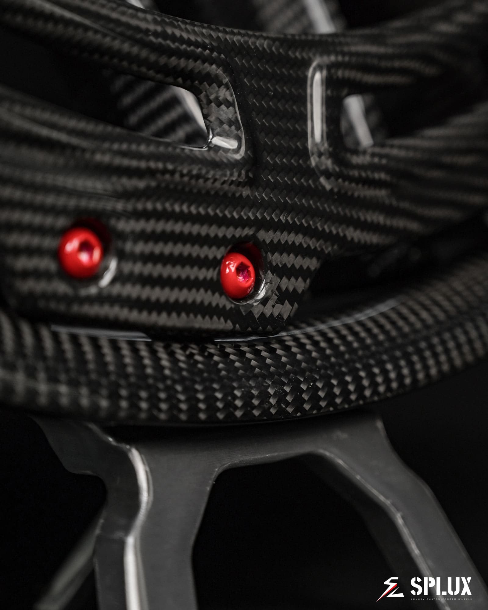 2000 corvette carbon fiber wheels details with red screws. fully forged 2-piece y-spoke design. 